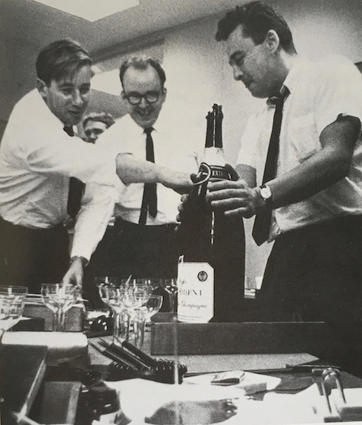 Peter Gzowski, Robert Fulford and Ken Lefolii with champagne