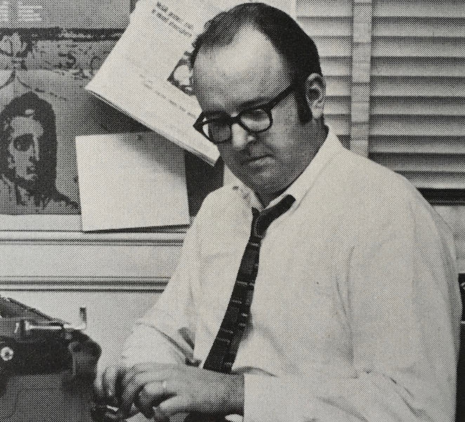 Robert Fulford using a typewriter